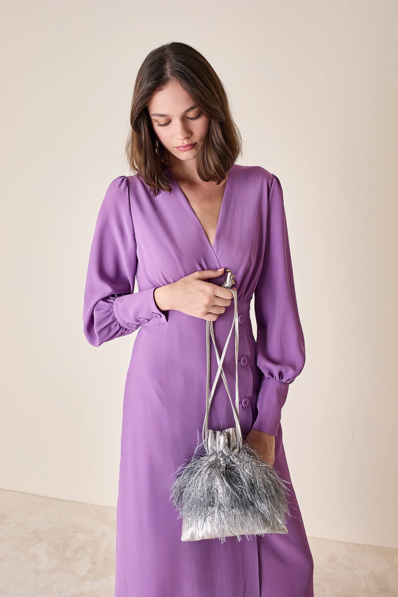 Feathered-look drawstring bag