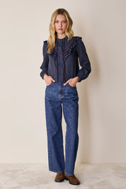 Camicia con volant e dettagli in velluto