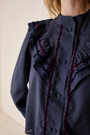 Camicia con volant e dettagli in velluto