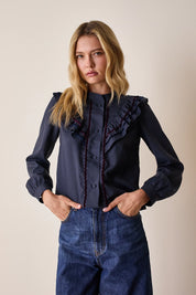 Camicia con volant e dettagli in velluto