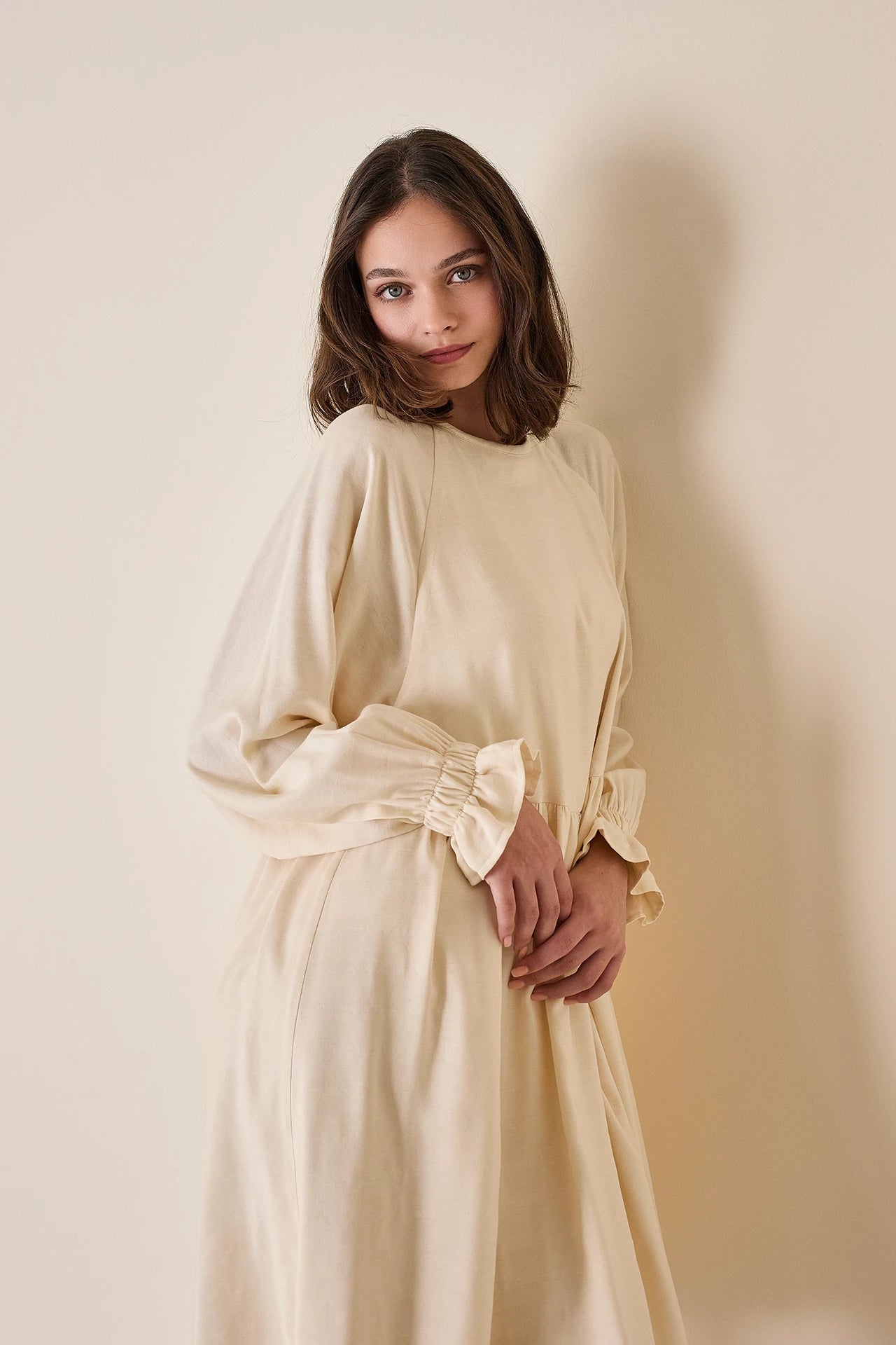 Abito con maniche a sbuffo