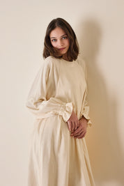 Abito con maniche a sbuffo