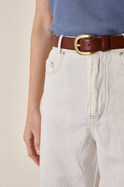 Leather belt with crescent moon buckle