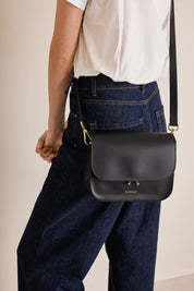 Rectangular shoulder bag with push-lock fastening