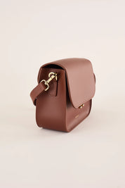 Rectangular shoulder bag with push-lock fastening