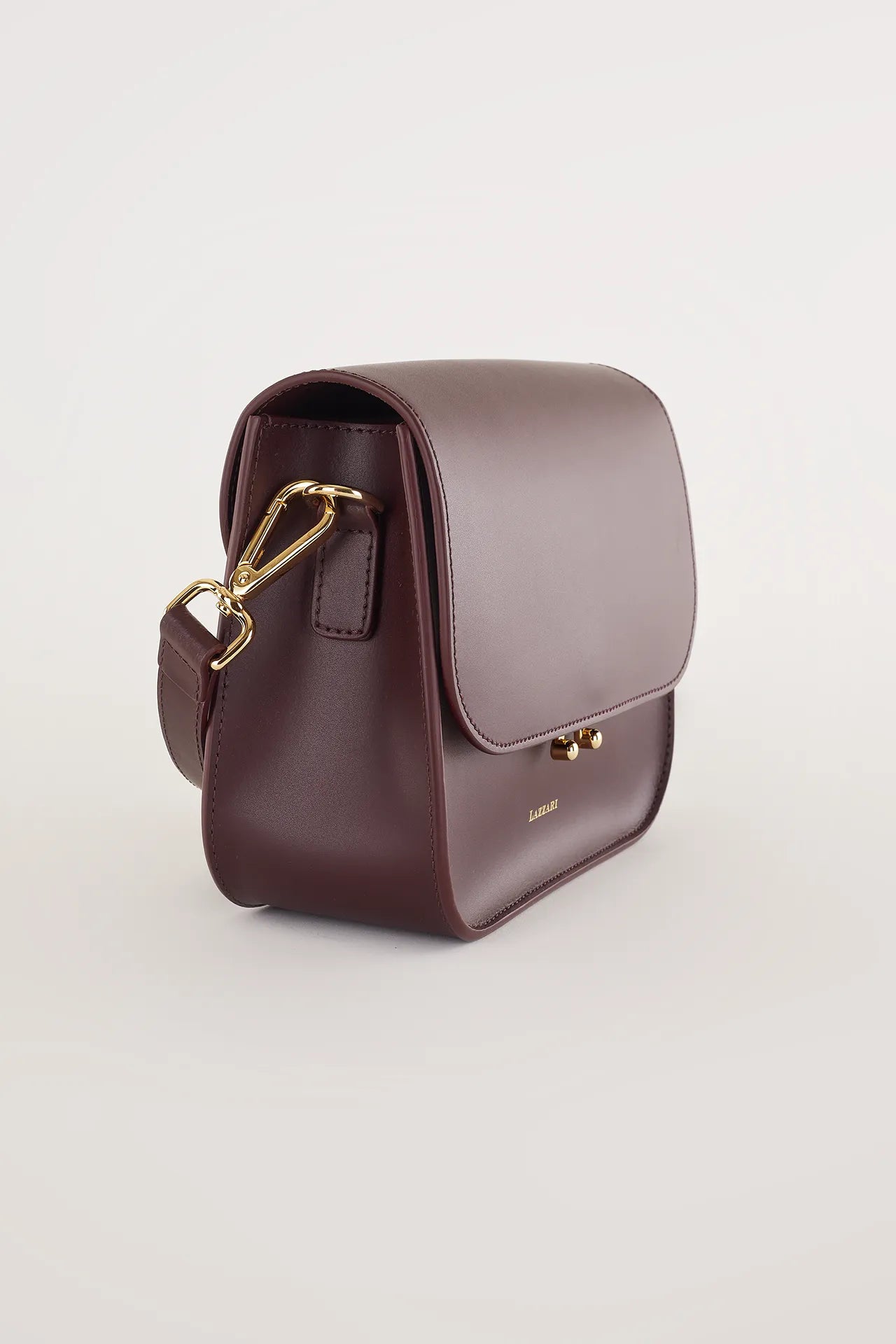 Rectangular shoulder bag with push-lock fastening