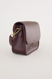 Rectangular shoulder bag with push-lock fastening