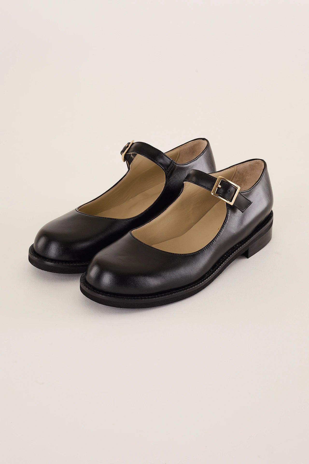 Round-toe Mary Janes with rubber sole