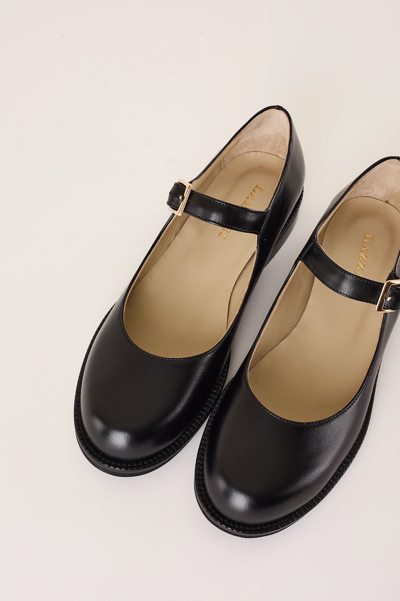 Round-toe Mary Janes with rubber sole