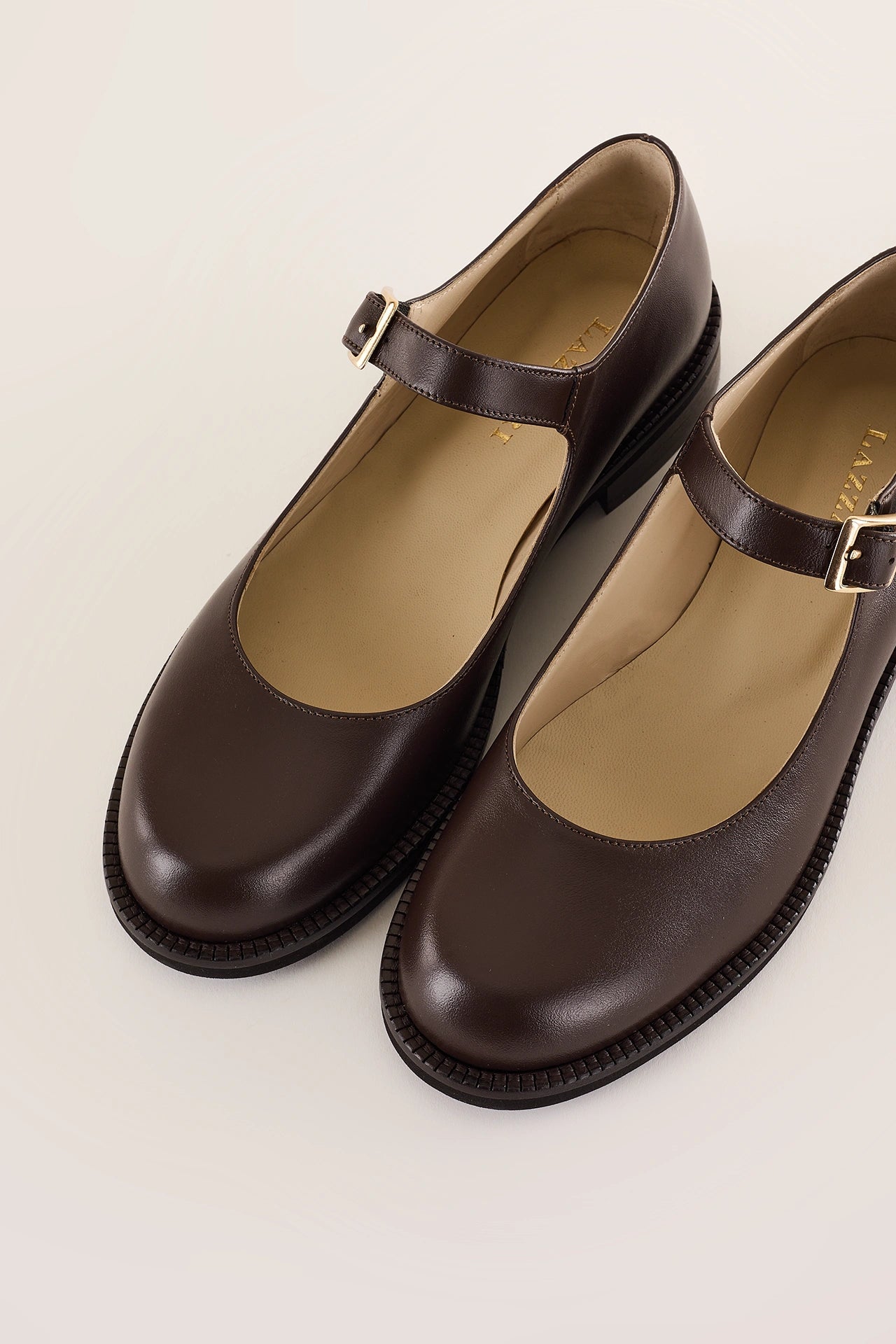 Round-toe Mary Janes with rubber sole