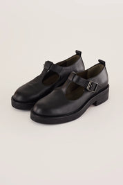 Scarpe t-bar con occhietti