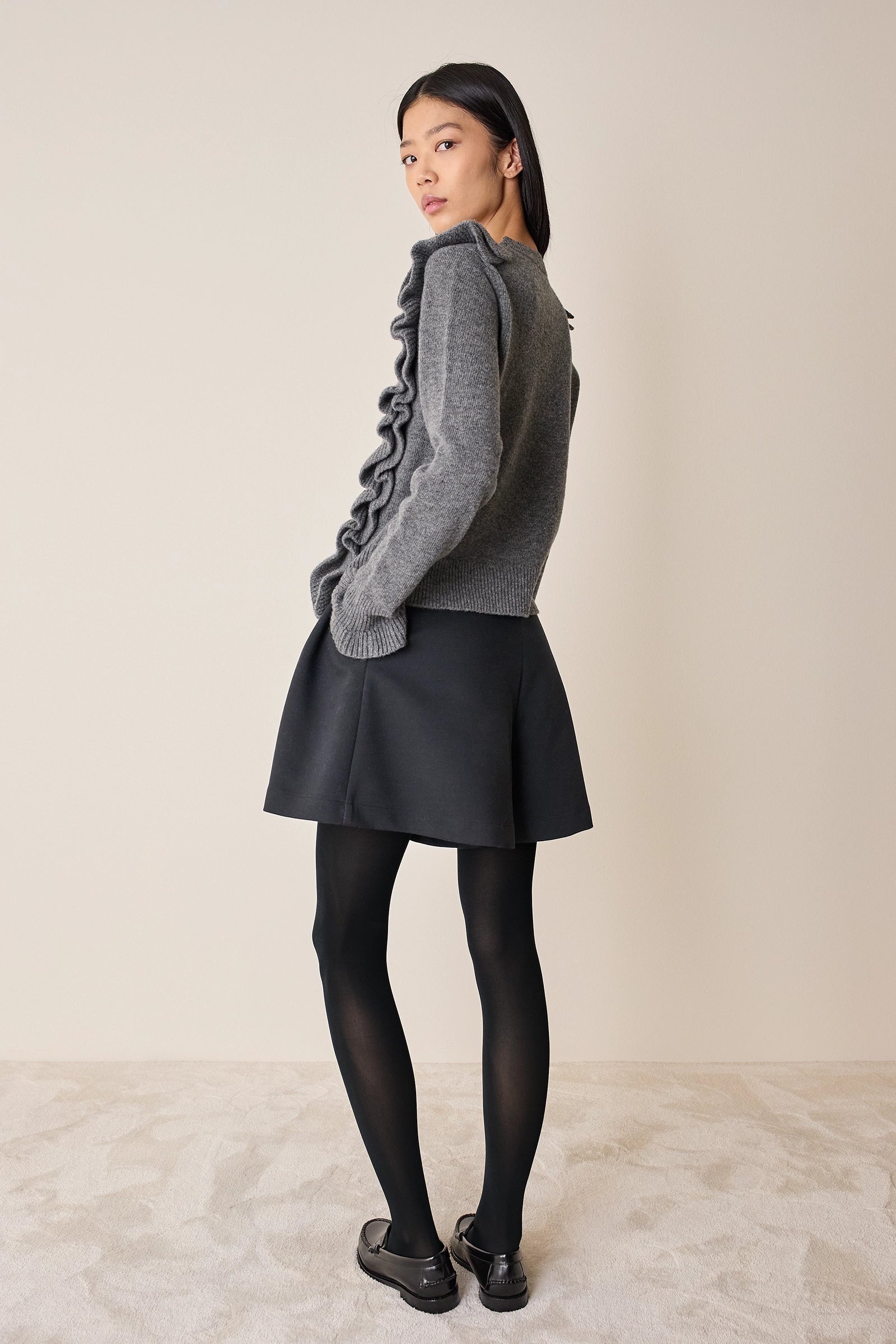 Wool sweater with maxi ruffles