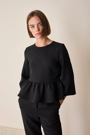 Top con balza in lana stretch
