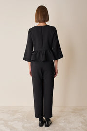 Top con balza in lana stretch