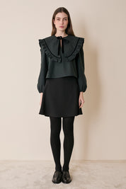 Top tartan con maxi colletto