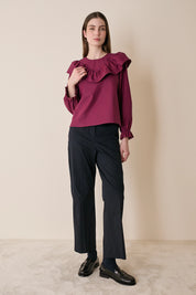 Top a quadretti con maxi volant