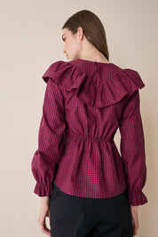 Top a quadretti con maxi volant