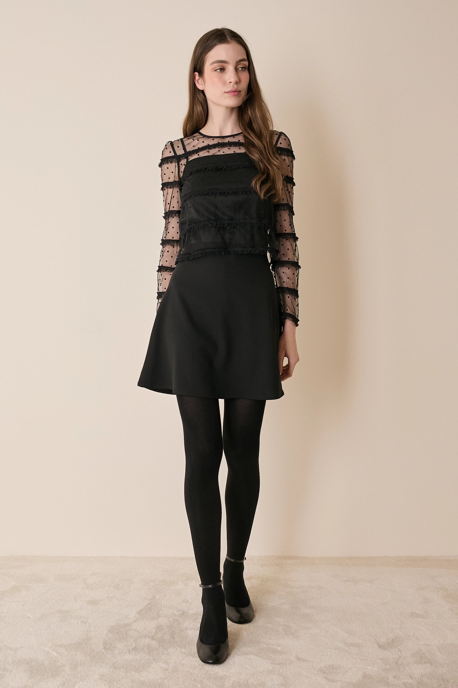 Top in tulle con volant