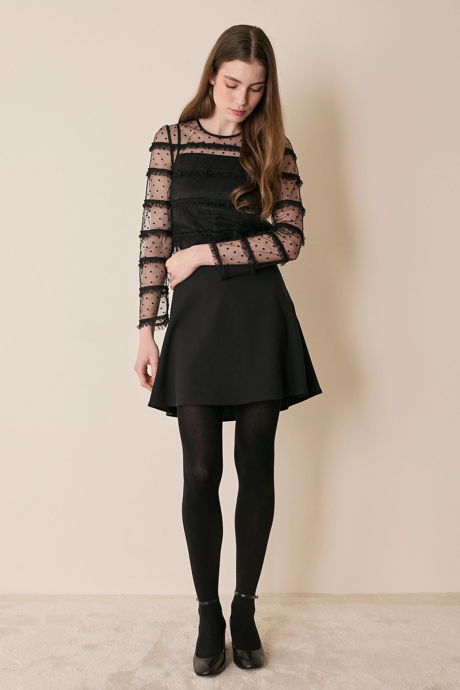 Top in tulle con volant