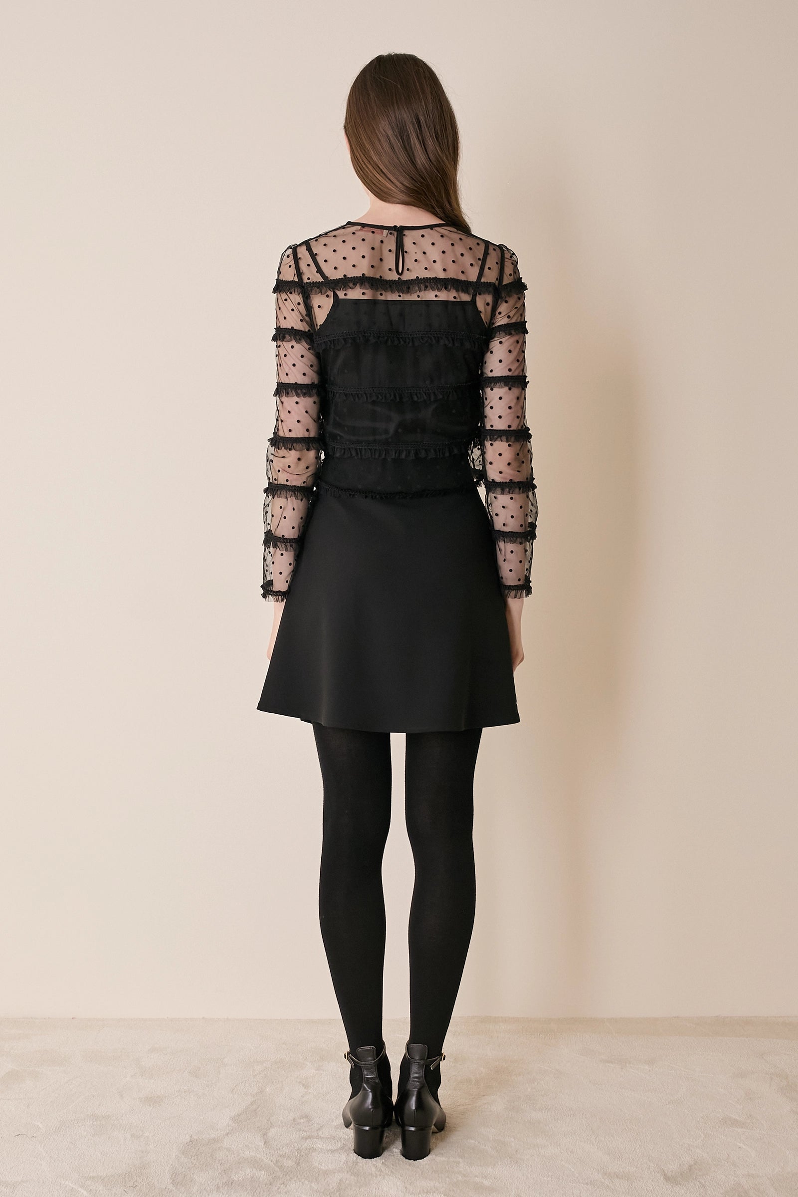 Top in tulle con volant