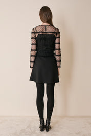 Top in tulle con volant