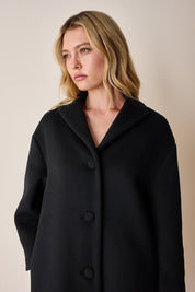 Cappotto a uovo in lana vergine