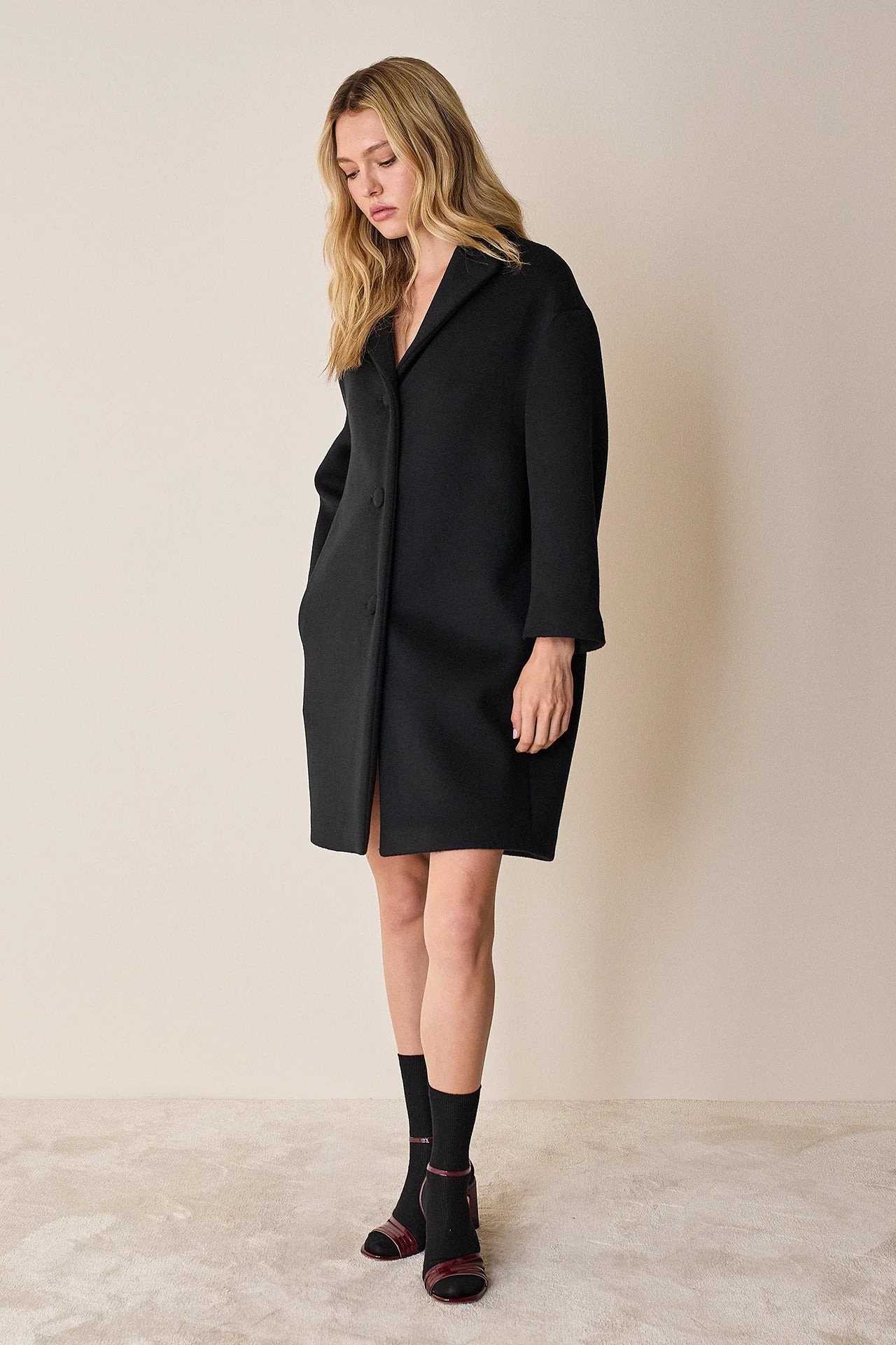 Cappotto a uovo in lana vergine