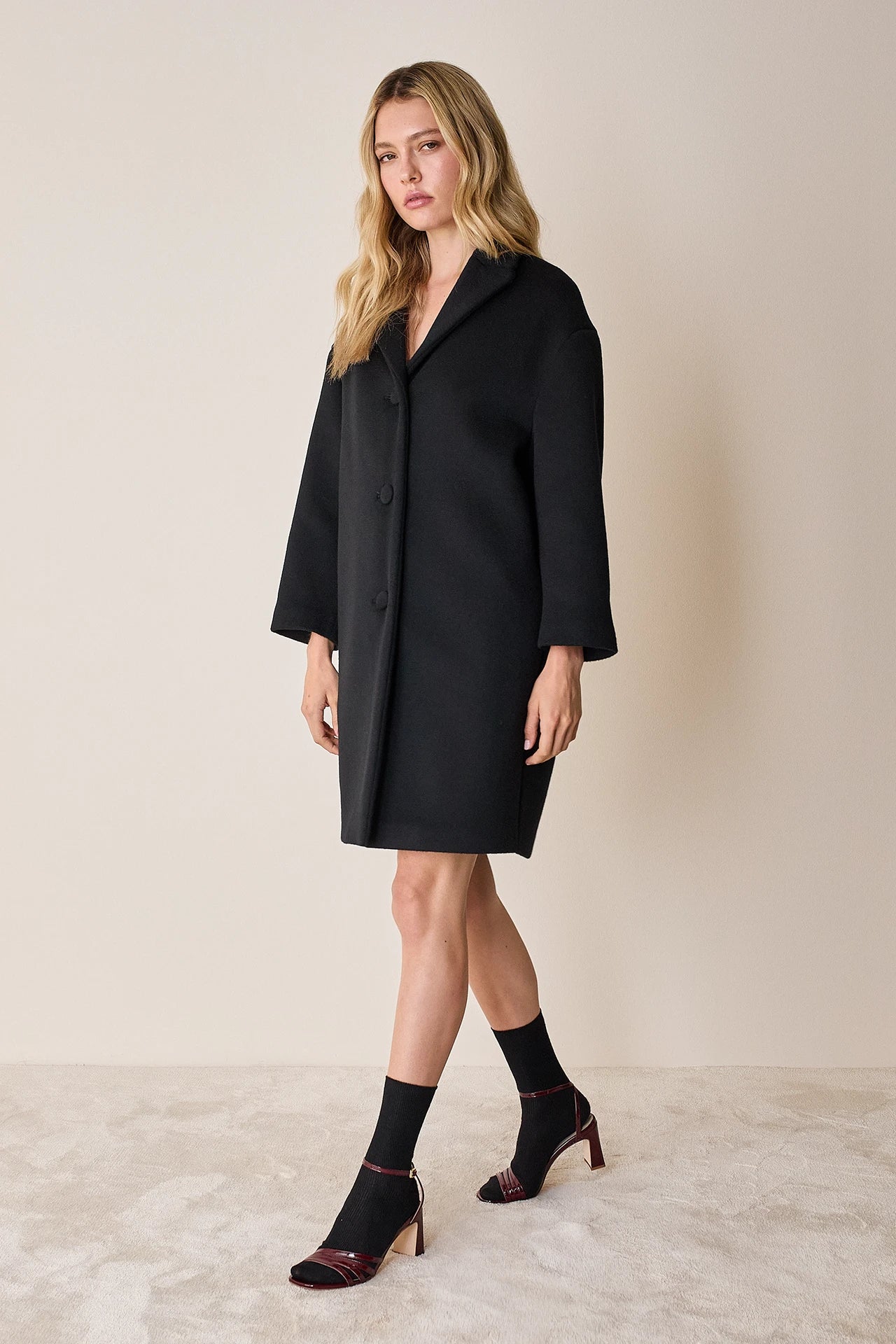 Cappotto a uovo in lana vergine