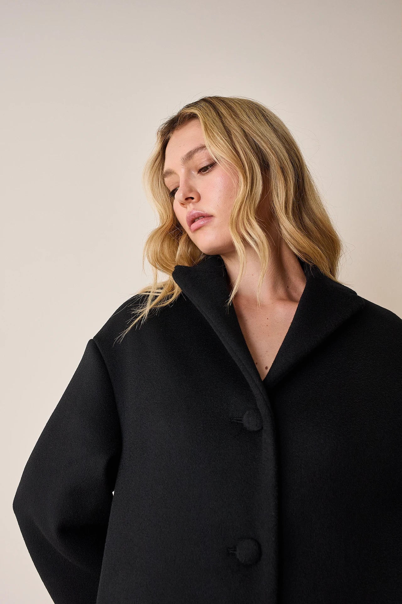 Cappotto a uovo in lana vergine