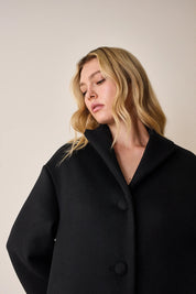 Cappotto a uovo in lana vergine