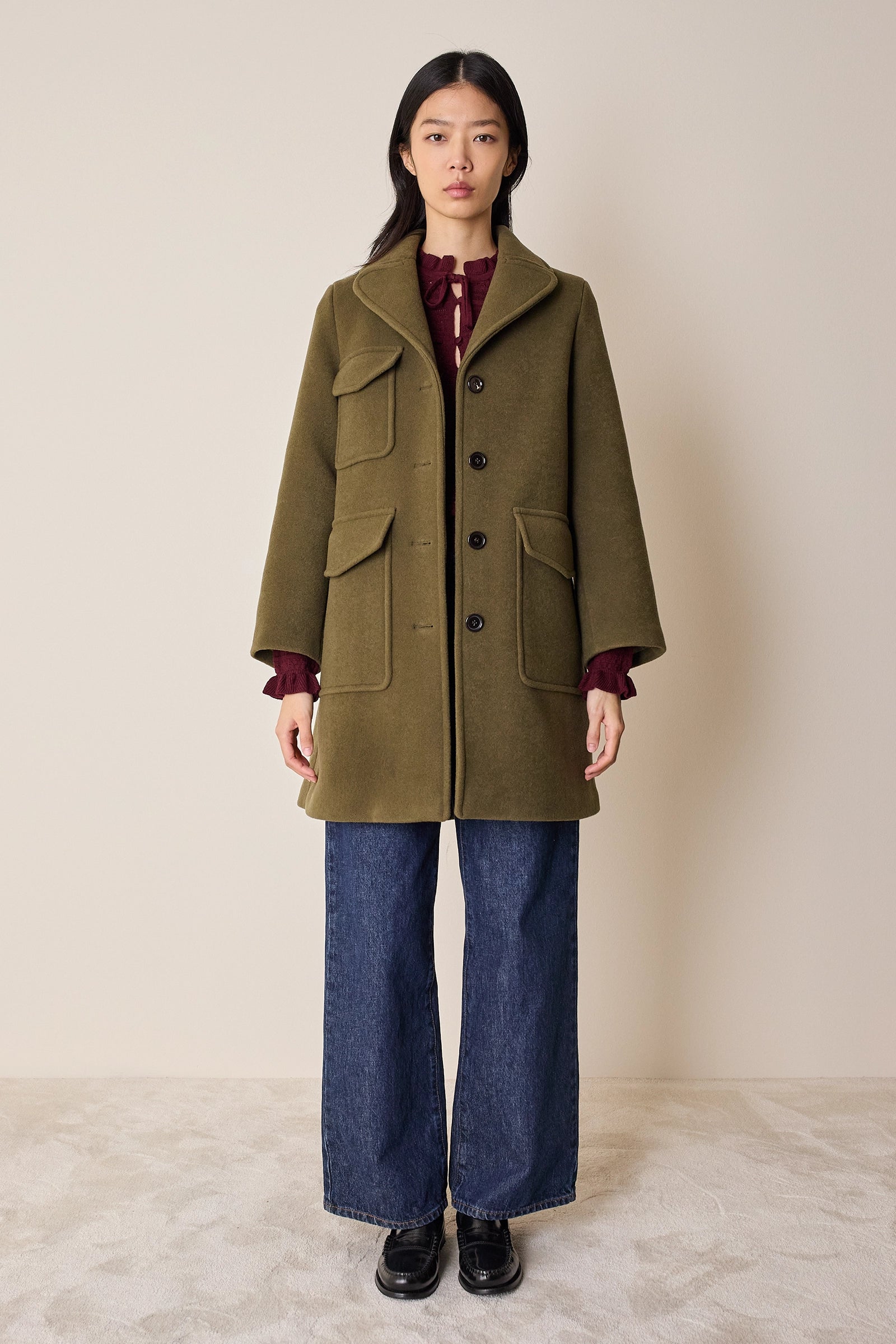 Cappotto con tasche applicate