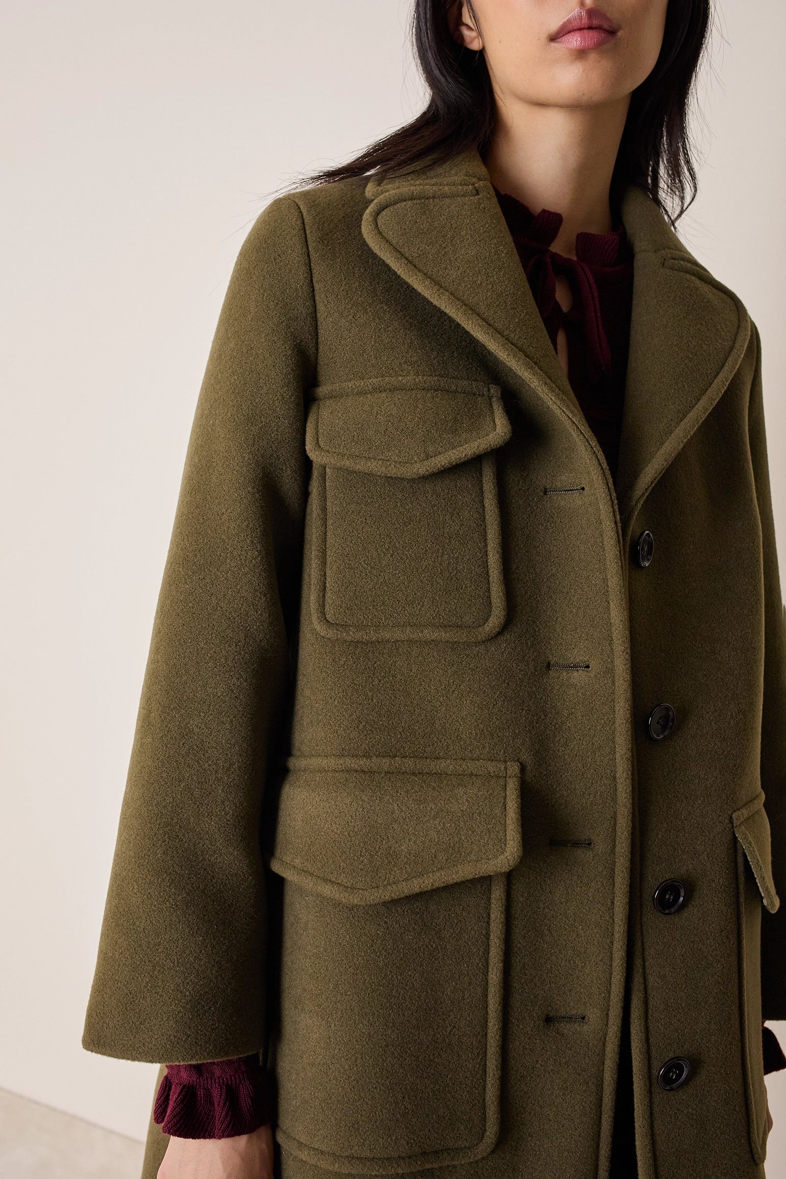 Cappotto con tasche applicate