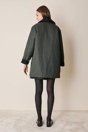 Giacca imbottita con colletto in velluto