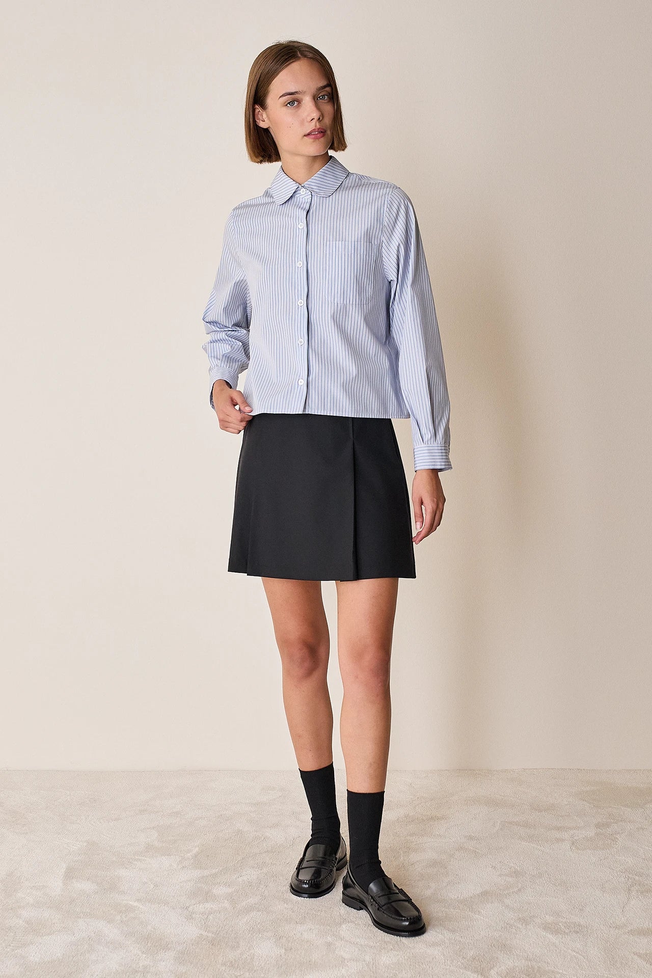 Box pleats mini skirt