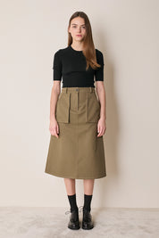 Gonna midi con tasche applicate