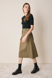 Gonna midi con tasche applicate