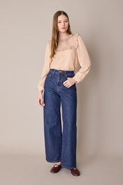 Blusa in organza di seta con volant