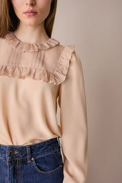 Blusa in organza di seta con volant