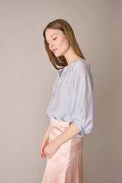 Top a righe in blend di seta