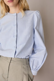 Camicia girocollo con maniche a sbuffo