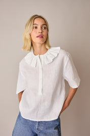 Linen polo top with ruffles