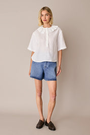 Linen polo top with ruffles