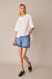 Linen polo top with ruffles