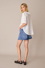Linen polo top with ruffles