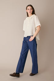 Polo in lino con volant