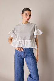 T-shirt con balze a contrasto