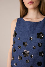 Top in denim con ricami paillettes