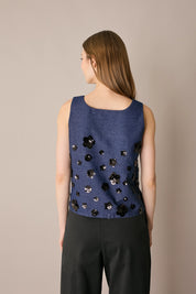 Top in denim con ricami paillettes