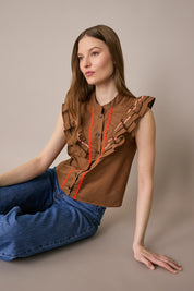 Camicetta con volant e serpentine colorate