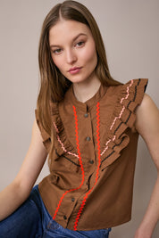 Camicetta con volant e serpentine colorate